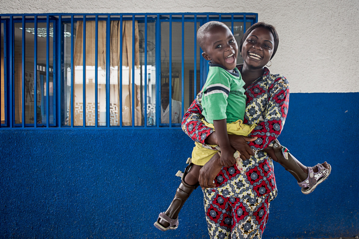 Jeanne and her son Jacques, who has just been fitted with orthotics